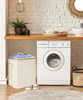 Beige 60L Collapsible Laundry Basket With Lid, Waterproof Oxford Fabric Tote With Bamboo Frame in modern laundry room