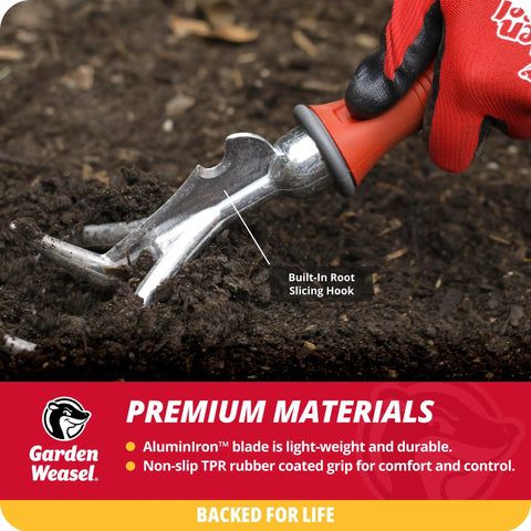 Double Sided Garden Cultivator And Tiller For Simple Soil Aeration And Tillage in use with red handled grip on soil