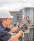 Technician installing 60/5 MFD Run Capacitor For AC Motors And HVAC Systems 370 To 440V CBB65 Direct Replacement
