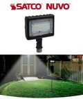 16 Pack Tough As Nails Led Small Flood Light Pumping Out Bold 5000K Daylight With A Sleek Bronze Housing That Is Fully Waterproof For Any Backyard Patio Deck Setup in use illuminating a patio.
