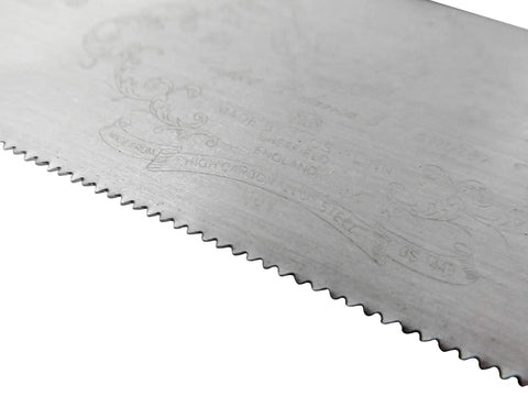 Close-up of the blade of the Kickass Eight Inch Dovetail Saw With Beefy Rolled Brass Back and Classic Walnut Grip.