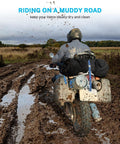 Motorcycle on muddy trail carrying Extra Large Waterproof Duffel Bag 80L With Roll Top Closure And PVC Build
