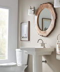 Westchester One Handle Bathroom Faucet Brushed Nickel in a modern rustic bathroom with a circular mirror and white sink