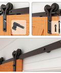 12ft Sliding Barn Door Hardware Kit With Floor Guide And Premium Nylon Roller Wheels installed on a wooden door