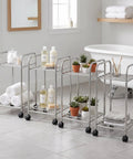 Metal Storage Rack On Wheels, Floor Standing Movable Shelving Unit For Easy Home Organization in a bathroom setting