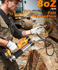 Worker using 12000 PSI Cordless Electric Grease Gun Kit with Dual 4.0Ah Batteries on construction equipment