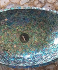 Top Shelf Oval Marble Vessel Sink With Real Abalone Shell Detailing And 24 By 19 Inch Bathroom Basin showing intricate abalone detail.
