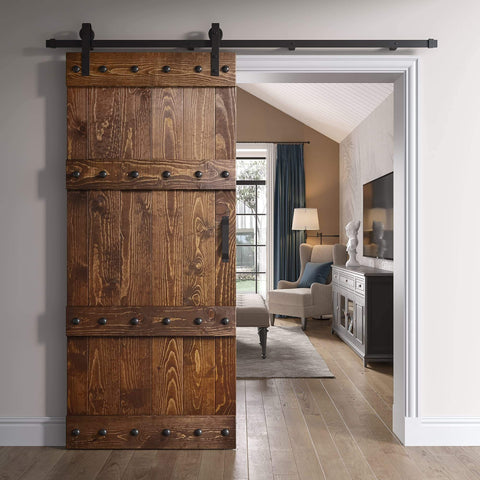 Knotty Pine Sliding Barn Door Kit 36 in Wide by 84 in High Dark Walnut Finish Handcrafted in USA Unassembled Panels Hardware Included Smooth Silent Tracks Pre-Drilled Holes for Easy Install Game Changing Home Upgrade installed in living room doorway