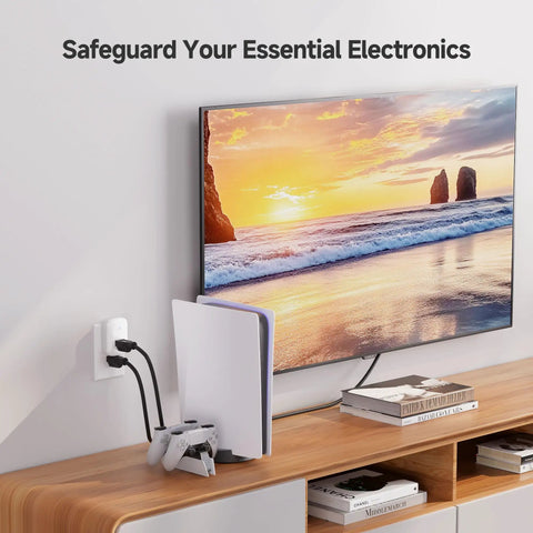 1350 Joules Single Outlet Surge Protector For TV PC Xbox PS5 Refrigerator And More 15A 1875W Wall Surge Protector With 500V Clamping Voltage ETL Listed White Gamer Ready, wall-mounted near TV and gaming console.