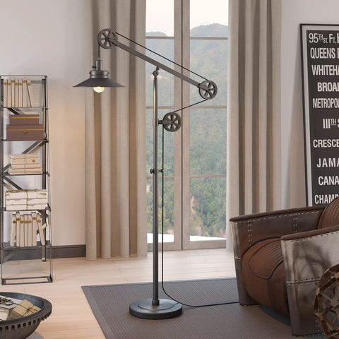 Go-To Pulley System Floor Lamp With Wide Brim Fabric Shade In Aged Steel Finish in a modern living room setting