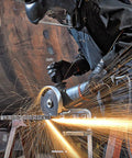 Worker using 50 Pack 4 1/2 Inch Ultra Thin Cut Off Wheels For Metal Cutting Stainless Steel Aluminum 0.040 Inch Thickness 7/8 Inch Arbor Type 41 Angle Grinder Disc Perfect For Rebar Pipes And Scrap Metal Demolition, metal cutting with sparks