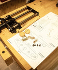 Nine Inch Quick Release Workbench Front Vise With Heavy Duty Cast Iron Body on table with assembly instructions and hardware.