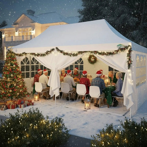 10x20 Pop Up Canopy With 6 Sidewalls For Parties And Outdoor Events, Waterproof UV50 Instant Shelter Gazebo, 200 Sq Ft Coverage, Accommodates 15 To 20 People, Peak Roof With Enhanced Drainage And Included Sandbags set up for a festive outdoor gathering with snow and holiday decorations.