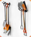 4 Pack Heavy Duty 12 Inch Long Wave Wall Mount Hooks For Ladders Shovels Chairs And Garden Tools Steel Garage Organizer With 60 Lb Capacity Black Matte Finish Maximizes Wall Storage And Keeps Your Tools Easy To Grab showing shovels and tools organized in garage