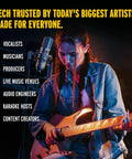 Musician playing guitar on stage with mic, featuring VX5 Vocal Effects Pedal With Antares AutoTune Real Time Pitch Correction.