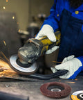 Worker using 40 Piece Flap Disc Set For Angle Grinder Four And A Half Inch By Seven Eighths Inch Arbor Type 27 on metal surface