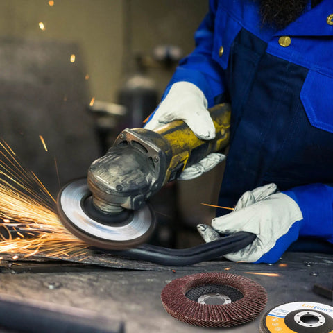 Worker using 40 Piece Flap Disc Set For Angle Grinder Four And A Half Inch By Seven Eighths Inch Arbor Type 27 on metal surface