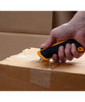 Self Retracting Safety Knife With Fully Auto Blade Release And Round Tip, Spring Activated Blade That Retracts On Lift, Unoverrideable Safety Guard, Durable Construction For Pro Grade Precision And Mess Free Cuts, used on cardboard box