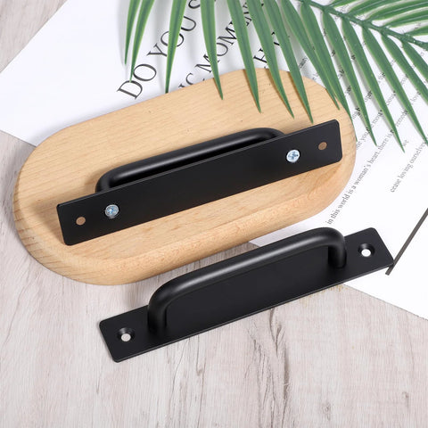 2 Pack Sliding Door Pull Handles Black Matte Aluminum Hole Center Gate Handles for wooden doors displayed on a wooden surface.
