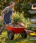 Man using Heavy Duty Dual Wheel Wheelbarrow Garden Cart With Built In Stand For Yard And Garden, 4 Cu Ft Cargo Capacity, Up To 600 Pound Load, Red Home Utility Wagon filled with rocks and soil