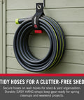 Heavy Duty Extension Cord Organizer With Large 18 Inch Straps For Slick Garage Wall Storage No Mess Setup Built Like A Tank Holds Solid One Hundred Pounds Includes Two Black Packs For Fast Wall Hook Or Nail Mounting, holding hoses neatly on wall with secure straps.