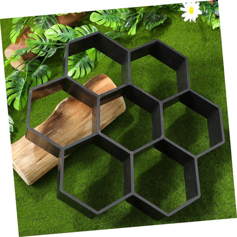 Hexagon Concrete Paver Mold For DIY Gardens And Patios, Reusable Plastic Tile Molds To Create Custom Garden Paths, Size 11.41 X 11.02 X 1.69 In, displayed on artificial grass