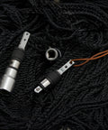 Dual 2 In 1 Hex to Square Drive Extension Set with Quick Swap for One Quarter Inch Hex Ends and Flat Ends on black fabric