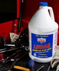 Engine Oil Stop Leak Formula For All Oil Types That Keeps Your Ride Quiet, Reduces Oil Consumption, Boosts Oil Pressure, And Rebuilds Worn Seals Safely Without Solvents, Compatible With Petroleum, Semi-Synthetic And Full Synthetic, 1 Gallon bottle in red toolbox
