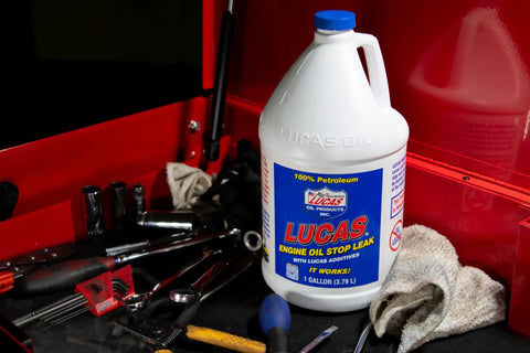 Engine Oil Stop Leak Formula For All Oil Types That Keeps Your Ride Quiet, Reduces Oil Consumption, Boosts Oil Pressure, And Rebuilds Worn Seals Safely Without Solvents, Compatible With Petroleum, Semi-Synthetic And Full Synthetic, 1 Gallon bottle in red toolbox