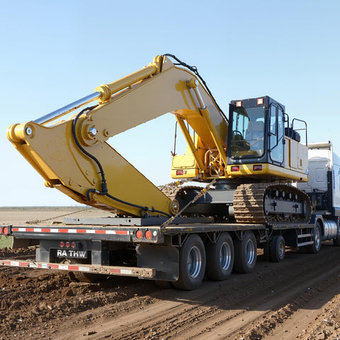 Truck transporting excavator with Beefy Ratchet Chain Binder Set Five Sixteenth Inch Ten Foot G80 Chains 8000 Lbs Working Load Heavy Duty Tie Down Gear