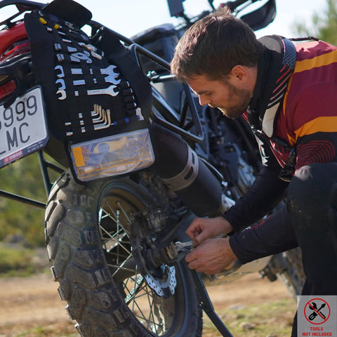 Man using Compact Roll Up Motorcycle Tool Bag With MOLLE Strap For Grab-And-Go Kit, Wrench Roll Organizer Pouch on bike