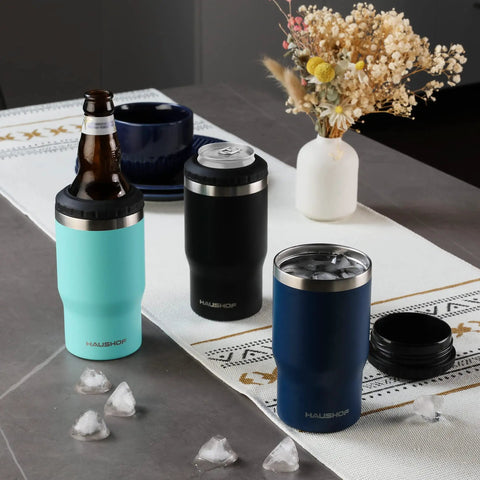 Hella Tough Navy Blue Four In One Insulated Stainless Steel Drink Koozie Fits 12 Oz Cans And Beer Bottles Transforms To Tumbler on table