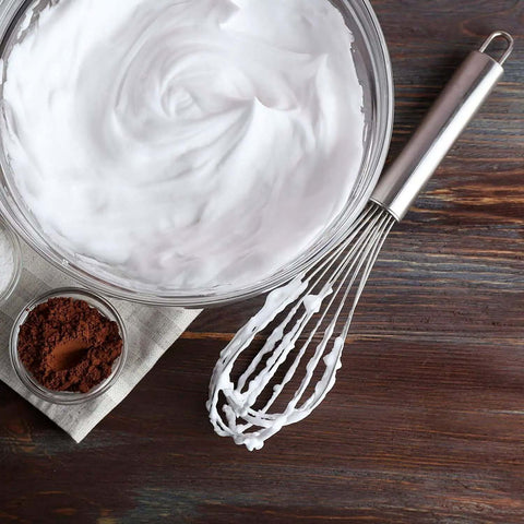 3 Pack Stainless Steel Balloon Whisks Set For Cooking, Blending, Beating And Stirring next to whipped cream in a bowl