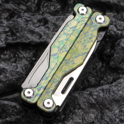 Ultra Lightweight Titanium Alloy Multitool Pliers With Camouflage Finish closed on black rock surface