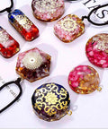 Colorful resin pendants with intricate designs from the All In One Resin Kit For Beginners And Pros With 125 Pieces Jewelry Making Set.