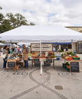 Pop Up Canopy Tent 10x20 Instant Outdoor Shelter For Parties And Weddings with vendor tables at farmer's market.
