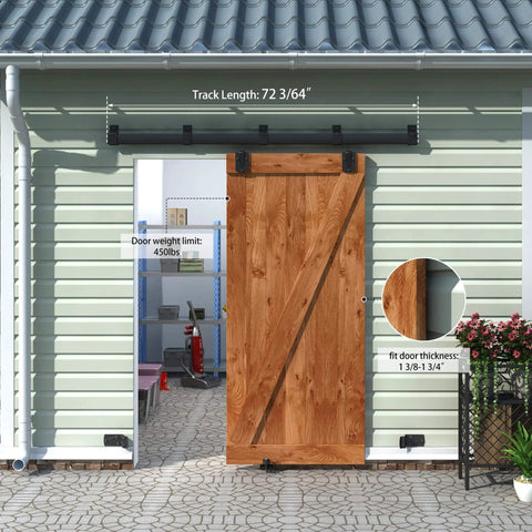 Outdoor wall with 6Ft Black Exterior Sliding Barn Door Hardware Track Kit, wooden barn door installed, weatherproof rail system.