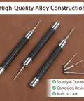 Three Piece Watch Link Remover Tool Kit With 0.7mm, 0.8mm And 0.9mm Precision Punches For Band Links on a brown background