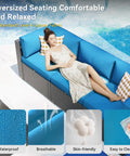 Person lounging on All Weather Wicker Outdoor Furniture Set, 7 Piece Sectional Sofas With Waterproof Cover, peacock blue.