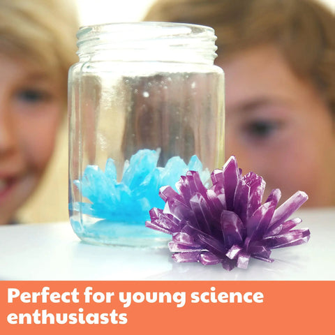 Children observing blue and purple crystals from Crystal Growing Science Kit For Kids And Teens, 7 Hands On DIY Lab Experiments With Display Case