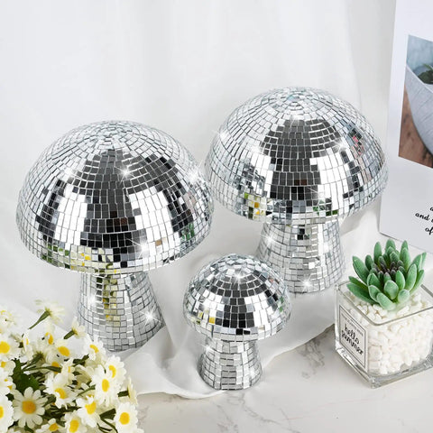 Mushroom Disco Ball Set Of Four, Silver Mirror Glitter Balls For Stage And Home Party Decor, 4 Inch, 4 Inch, 6 Inch And 7 Inch, shown on table