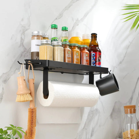 Garage Paper Towel Holder With Shelf And Hooks, Black Stainless Steel Wall Mount Organizer displayed with spices and brushes