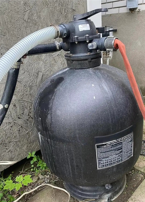 1.5 Inch Pool Replacement Hose For Above Ground Pools attached to black filtration system, showing connections and fittings.