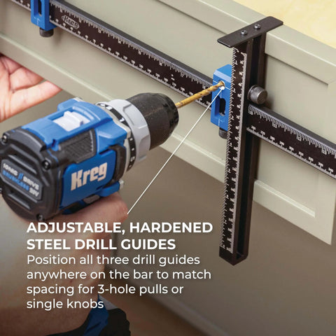 Adjustable drill guides being used with Cabinet Hardware Jig Pro XL Flexible Full Length To Compact Setup For Wide Pulls Or Knob Mounts