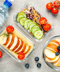 Glass meal prep containers filled with salad and fruit, part of 10 Pack Glass Meal Prep Containers With Airtight Lids, Stackable