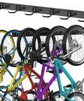 Six Bike Wall Mount Storage Rack With Interlocking Rails And Easy Snap Hooks displaying multiple bikes in a garage