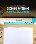 Adjustable 30 Hole Discbound Hole Punch for Custom Planners and Notebooks on wooden table with paper and crafting supplies
