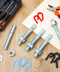 Badass 46 Piece Car Lift Install Kit Featuring Slick Wedge Anchor Bolts and Precision Leveling Shim Set with tools and bolts.