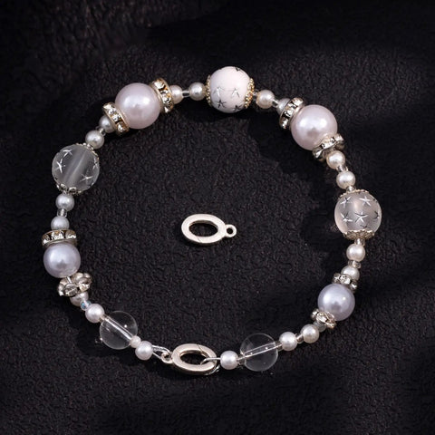 Sterling Silver 925 Oval Jewelry Clasp Hypoallergenic Connector With Ring 12x7mm displayed with decorative bracelet