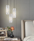 Three Light Crystal Kitchen Island Pendant with Nickel Finish over dining area with modern decor